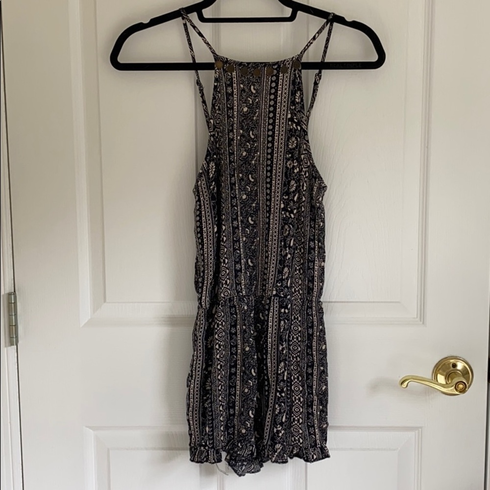 Sleeveless black patterned romper